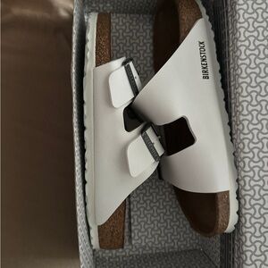 White Birkenstock sandals